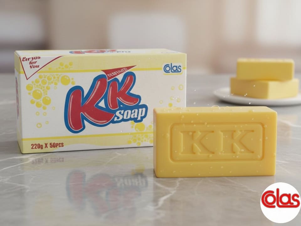 A KK Soap carton with an embossed yellow KK bar.